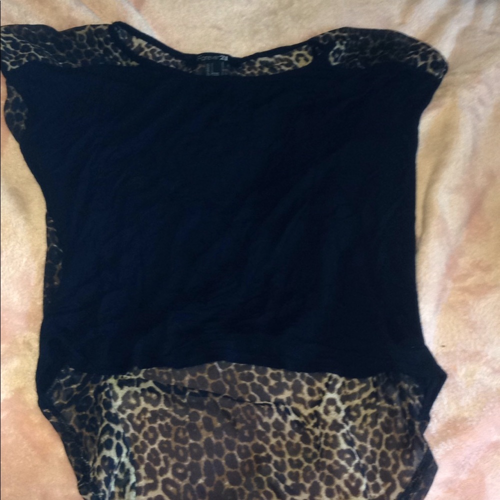 Dressy top with see through leopard print back.
